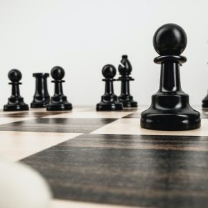 Macro photo of chess pieces on a chess board